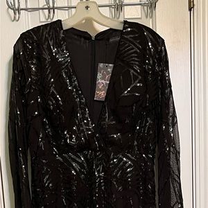 Giffniseti Black formal long dress in a large. Brand new